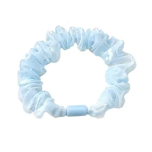 Light blue organza scrunchie with floral prints and durable buckle for high ponytails