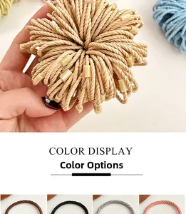 Macro detail of high-elasticity spiral woven hair ties in various neutral colors