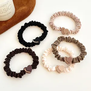 Five-pack set of velvet heart-shaped rhinestone hair ties in elegant earthy coffee tones