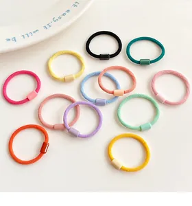 Close-up of assorted colorful high-elastic braided hair ties with smooth plastic buckles