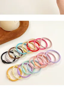 Detailed macro shot of high-elastic colorful spiral hair ties with durable plastic buckles