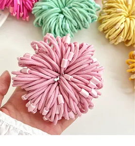 Macro shot of colorful high elasticity kids hair ties in various macaron colors