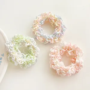 Three-piece set of macaron-colored thick knit scrunchies for ponytail styling