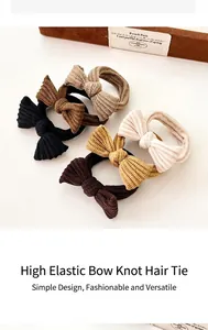 Detailed texture of high-elasticity bow hair ties in warm earthy corduroy colors