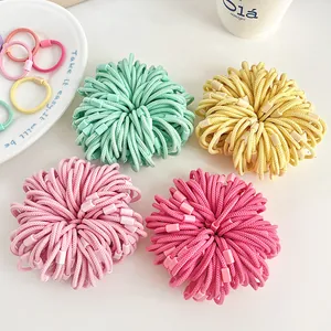 Coleteros elásticos macaron para niñas en colores verde, amarillo y rosa