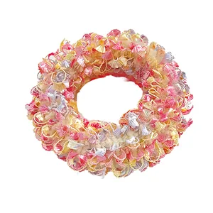 Colorful high-elastic tassel hair ties in pastel pink, yellow, and silver glitter fibers