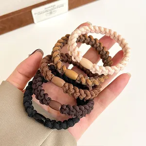 5-piece set of thick elastic braided hair ties in warm neutral earth tones for ponytails