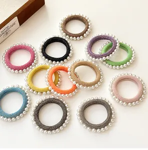 Vue détaillée des élastiques à cheveux en perles colorées à haute élasticité