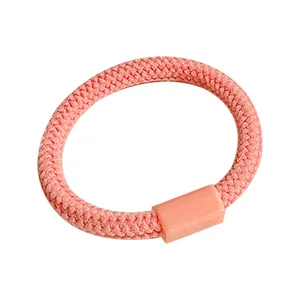 Élastique à cheveux rose épais pour filles avec texture tissée et raccord en plastique ton