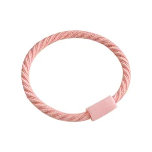 Elastic colorful spiral hair tie for children with soft texture in pale pink color
