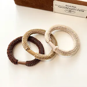 Three-pack thick high-elasticity braided hair ties in coffee, khaki and beige colors