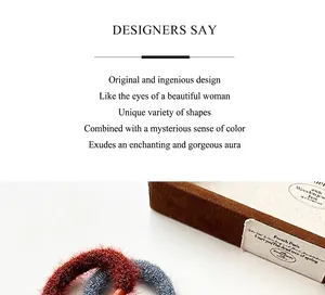 Detail of thick plush hair scrunchies on a jewelry box with soft chenille texture