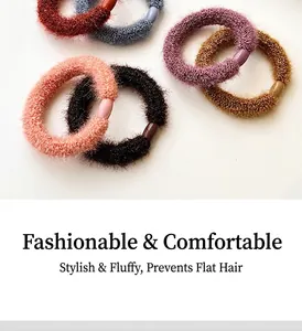 Detail of thick elastic plush hair ties in multiple soft colors on white background