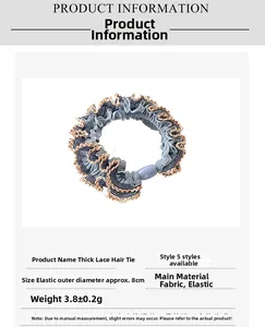 Detail of blue lace elastic hair tie showing 8cm diameter and durable fabric texture