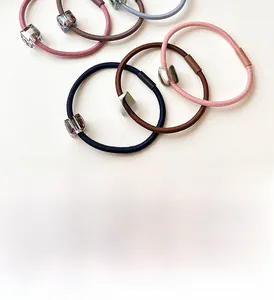 Close-up of high-elasticity crystal hair ties with square colorful beads in various colors