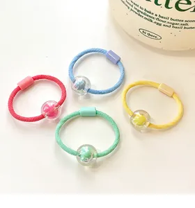 Close-up of high-elastic candy color beaded hair ties for kids in a four-piece set
