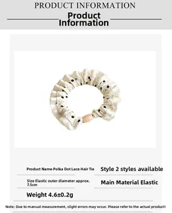 Detailed view of polka dot lace hair scrunchie with 7.5cm diameter and bead detail