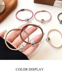 Detail of high-elasticity hair ties with colorful iridescent cube crystal beads