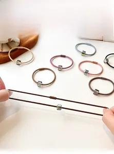 Detail view of high-elasticity hair ties with colorful square crystal beads