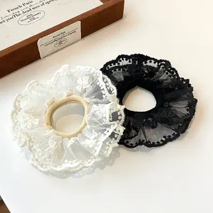 Elegant double-layer lace scrunchies in black and beige with wavy edges, set of 2 pieces