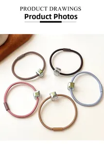 Detailed shot of five high-elasticity hair ties with transparent crystal square beads