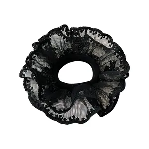 Elegant double-layered black lace scrunchie with detailed embroidery and ruffle design
