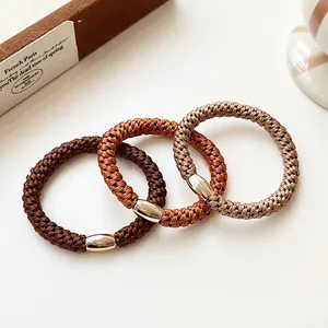 Three-piece high elasticity woven ponytail holders in coffee tones with gold metal rings