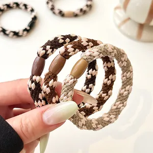 Elastic braided hair ties in earthy tones with decorative resin beads for women
