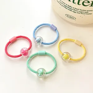 Colorful beaded hair ties for kids with transparent resin beads in four bright colors