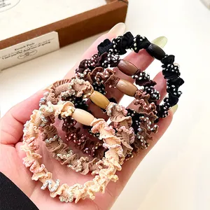 Lot de 5 chouchous élastiques à pois avec bordures à volants et perles en tons terre
