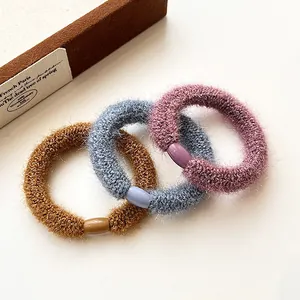 Three-piece thick plush elastic hair ties in brown, blue, and purple for women