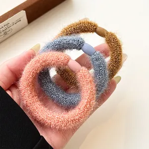 Three-piece set of thick elastic plush hair scrunchies in pink blue and brown colors
