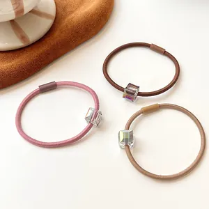 Elastic crystal bead hair ties in pink, brown, and beige colors for high ponytails