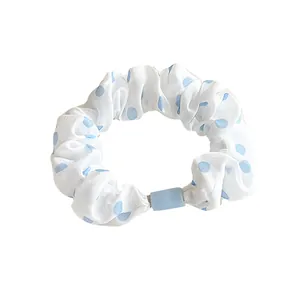 Polka dot fabric scrunchie in white and blue, high elastic hair tie for ponytails