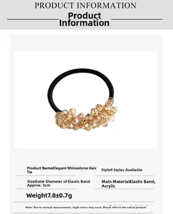 Detail showing high-elastic black hair tie with amber crystal bead and 5cm diameter size