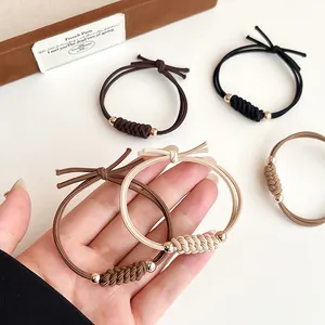Élastiques à cheveux tressés avec perles dorées tons terre pour queues de cheval et chignons