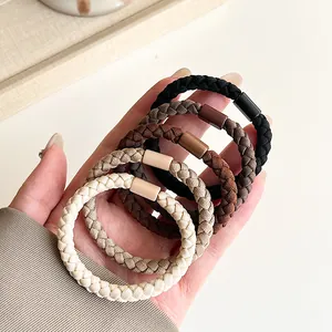 5-piece set of thick elastic braided hair ties in assorted earthy tones and neutral colors