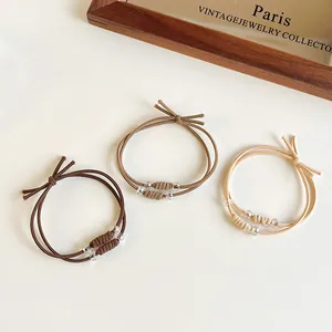 Elastische gevlochten haarringen set in koffietinten met kristallen kralen voor paardenstaart