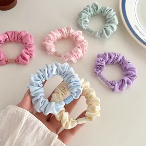 Thick solid color scrunchies in macaron tones with high elasticity for ponytails