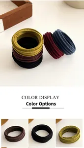 Detailansicht hoch-elastischer gerippter Haargummis in verschiedenen Vintage-Farben