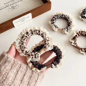 Retro leopard print scrunchies with elegant lace trim and high elasticity for women