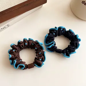 Set de 2 coleteros de lunares con bordes ondulados azules y cuentas decorativas