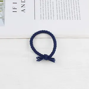 Handcrafted dark blue braided elastic hair tie with stylish twist design for women