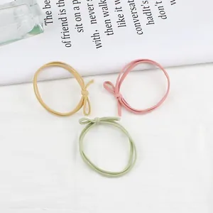 Set van 3 pastelkleurige gevlochten haarelastiekjes in geel, roze en lichtgroene kleur