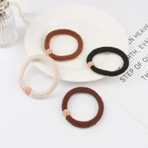 Elegante elastische Haargummis mit Strassperlen in Roségold in vier neutralen Farben