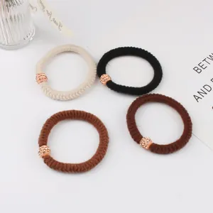 4er-Set hochelastische Haargummis mit Strass-Kugeln in Roségold und neutralen Farben