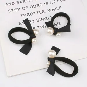 Three-pack black high-elastic hair ties with satin bows and elegant white pearls