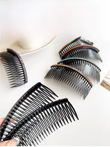Detail display of large rhinestone hair combs in multiple colors for hair styling
