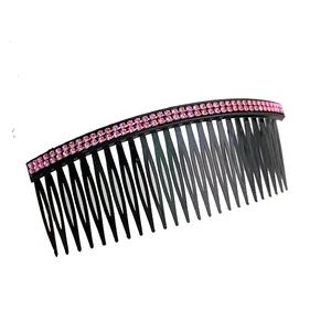 Large black hair comb with double rows of pink rhinestones shown from a side angle