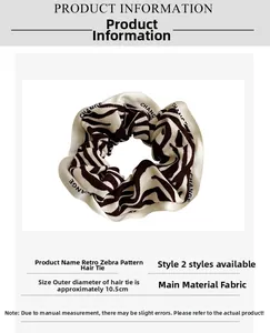 Detail view of vintage zebra pattern scrunchie with 10.5cm diameter and fabric texture